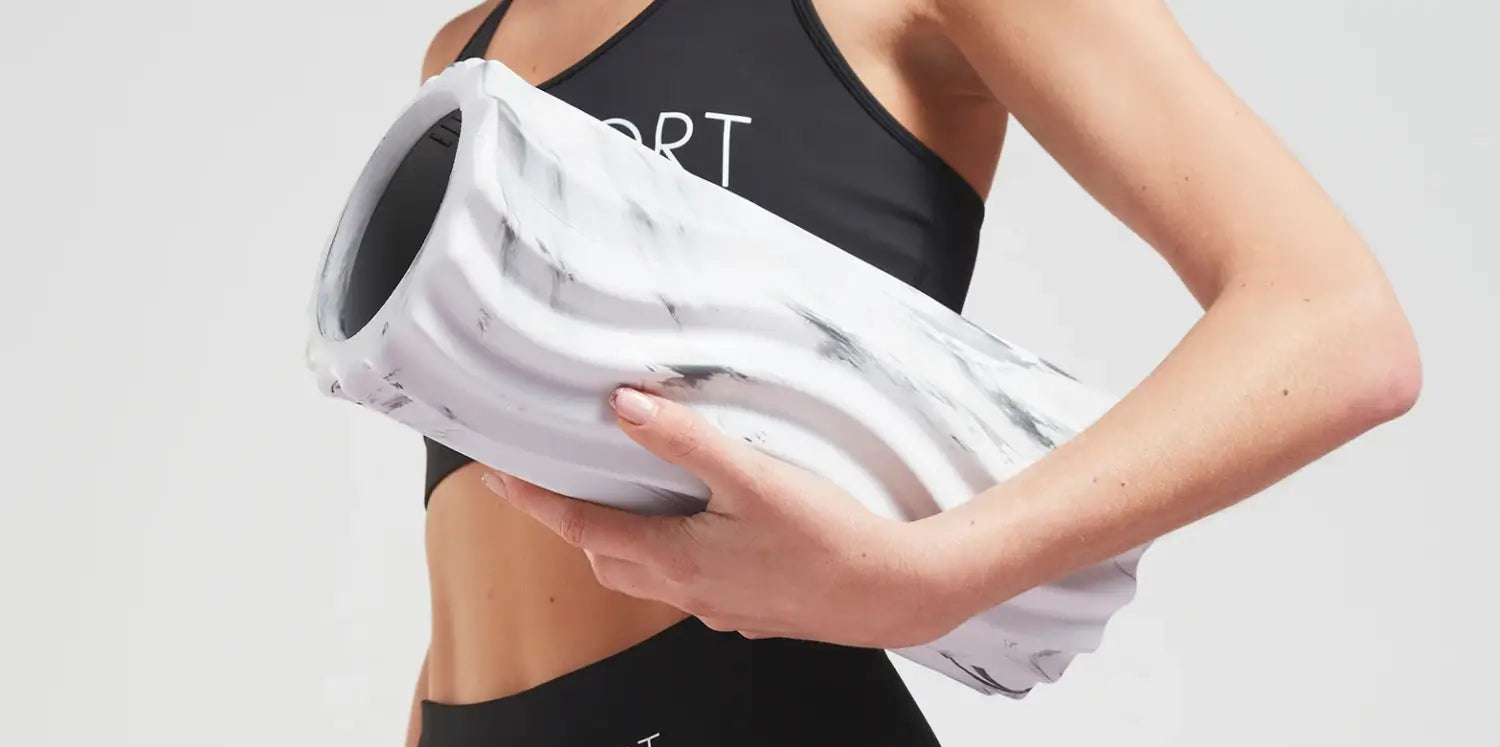 Rodillo Espuma Mármol 33 x 14 cm Elle Sport para aislar grupos musculares con superficie texturizada